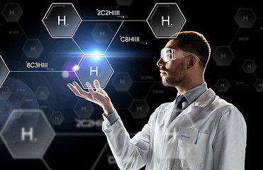 Image showing scientist in lab goggles chemical formula