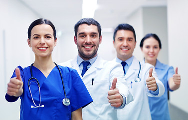 Image showing medics or doctors at hospital showing thumbs up