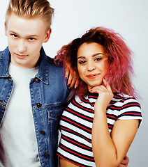 Image showing best friends teenage girl and boy together having fun, posing emotional on white background, couple happy smiling, lifestyle people concept, blond and brunette multi nations