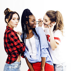 Image showing diverse multi nation girls group, teenage friends company cheerful having fun, happy smiling, cute posing isolated on white background, lifestyle people concept, african-american and caucasian 