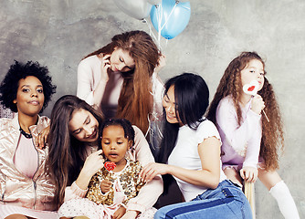 Image showing Lifestyle and people concept: young pretty diversity nations woman with different age children celebrating on birth day party together happy smiling, making selfie. African-american, asian and caucasi