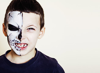 Image showing little cute boy with facepaint like skeleton to celebrate hallow