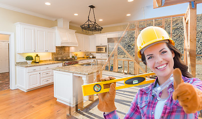 Image showing Female Construction Worker In Front of House Framing Gradating t