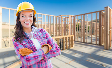 Image showing Young Attractive Female Construction Worker Wearing Gloves, Hard