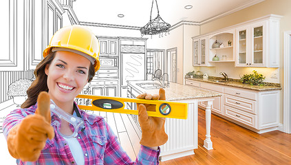Image showing Female Construction Worker In Front of Custom Kitchen Drawing Gr