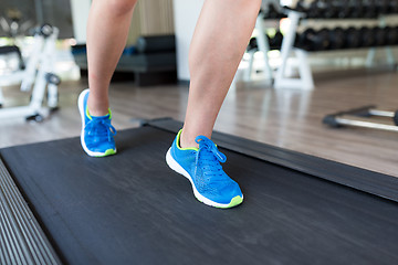 Image showing Woman legs on treadmill