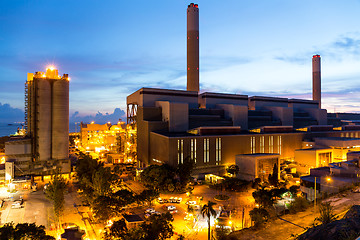 Image showing Cement plant at sunset