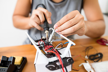 Image showing Welding to equip of flying drone