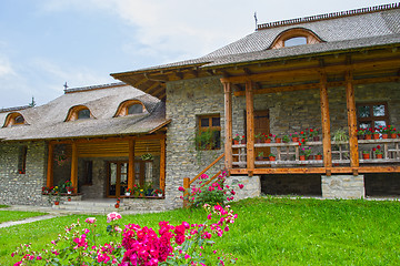 Image showing Flowers at Voronet Monastery