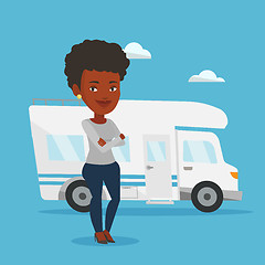 Image showing Woman standing in front of motor home.