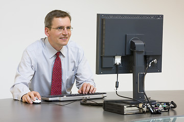 Image showing Businessman working with computer