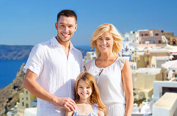 Image showing happy family over santorini island background