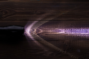 Image showing Wooden texture with glowing lantern