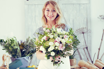 Image showing Beautiful florist at flower shop