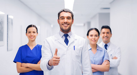 Image showing medics or doctors at hospital showing thumbs up