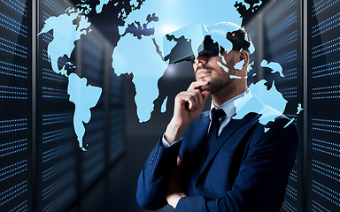 Image showing man in virtual reality headset with world map