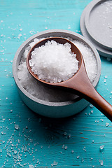 Image showing sea salt in stone bowl and wooden spoon