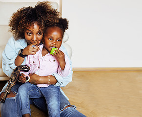 Image showing adorable sweet young afro-american mother with cute little daugh