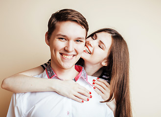 Image showing young pretty teenage couple, hipster guy with his girlfriend hap