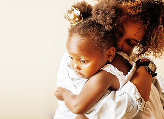 Image showing adorable sweet young afro-american mother with cute little daugh