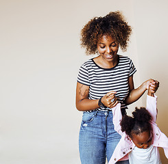 Image showing adorable sweet young afro-american mother with cute little daugh