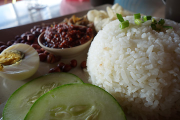 Image showing Nasi lemak, a traditional malay curry paste rice dish