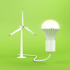 Image showing Wind turbine and glowing light bulb