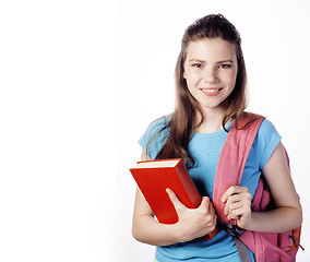 Image showing young cute teenage girl posing cheerful against white background with books and backpack isolated