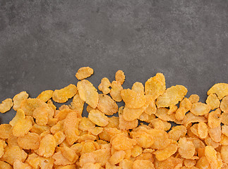 Image showing Corn flakes breakfast cereal line on a grey slate