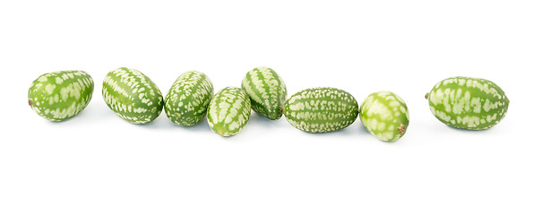 Image showing Row of eight cucamelons