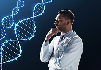 Image showing doctor or scientist in white coat with dna