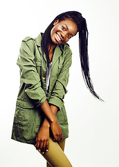 Image showing young pretty african-american girl posing cheerful emotional on white background isolated, lifestyle people concept 