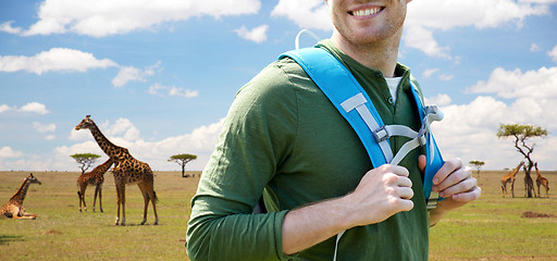 Image showing close up of happy man with backpack traveling