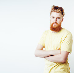 Image showing young handsome hipster ginger bearded guy looking brutal isolate