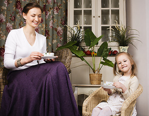 Image showing young mother with daughter at luxury home interior vintage