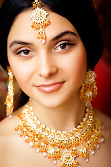 Image showing beauty sweet real indian girl in sari smiling on black background