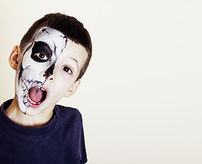 Image showing little cute boy with facepaint like skeleton to celebrate hallow