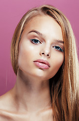 Image showing young pretty blonde woman with hairstyle close up and makeup on 