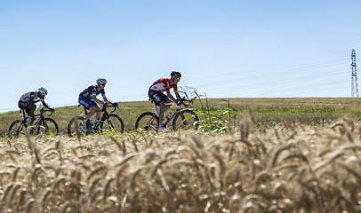 Image showing Three Cyclists in the Plain - Tour de France 2016