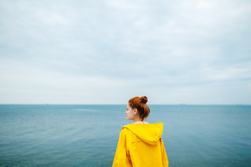 Image showing Girl posing on background of ocean