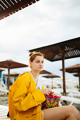 Image showing Girl posing on pebble beach