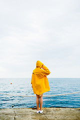 Image showing Anonymous girl on waterfront