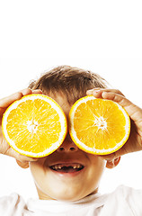 Image showing little cute boy with orange fruit double isolated on white smili