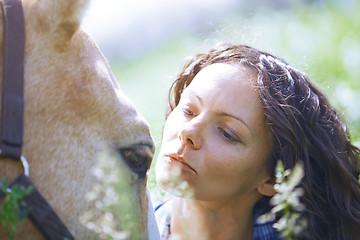 Image showing Woman and horse together at paddock