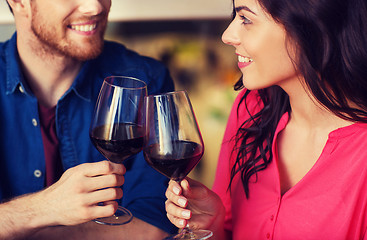 Image showing happy couple dining and drink wine at restaurant