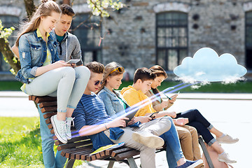 Image showing group of students with tablet pc at school yard