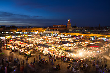 Image showing Jamaa el Fna market square at dusk, Marrakesh, Morocco, north Africa.