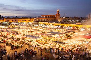 Image showing Jamaa el Fna market square in sunset, Marrakesh, Morocco, north Africa.