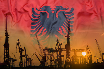 Image showing Industrial concept with Albania flag at sunset