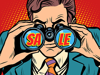 Image showing Sale Businessman looking through binoculars